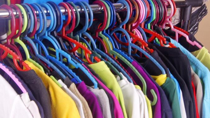 A rack of clothes on hangers