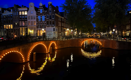 An Amsterdam canal at night.